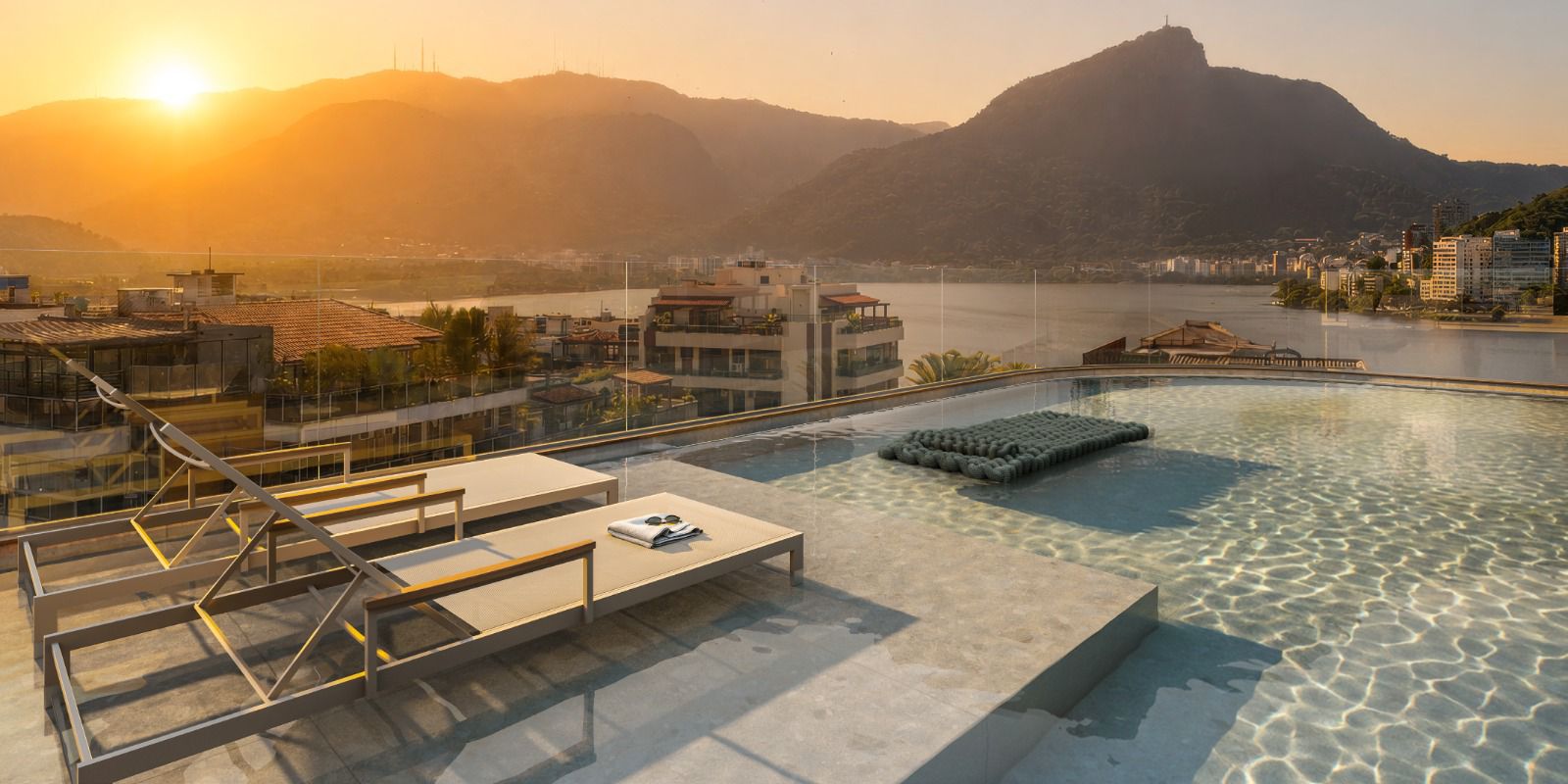 Rooftop infinity pool facing Corcovado at sunset